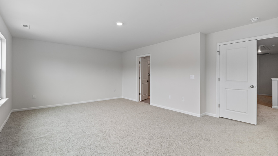 Bedroom with carpet flooring