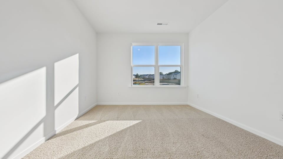 Bedroom with carpet flooring