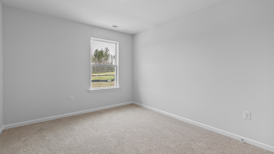 Bedroom with carpet