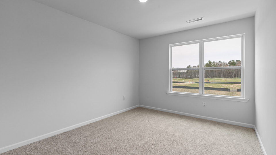 Bedroom with carpet