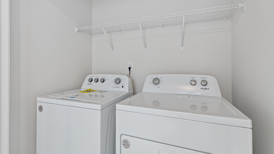 Laundry room with wire shelving