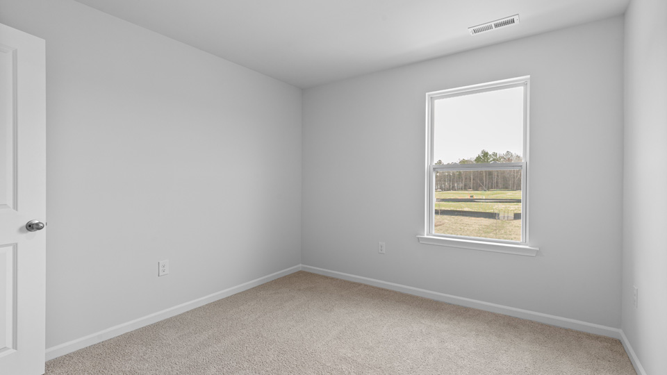 Bedroom with carpet flooring