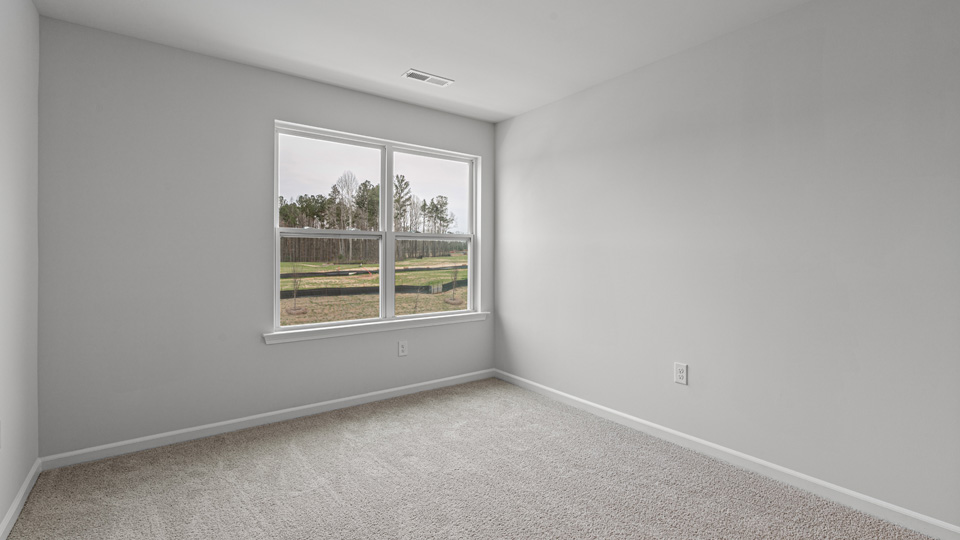 Bedroom with carpet flooring