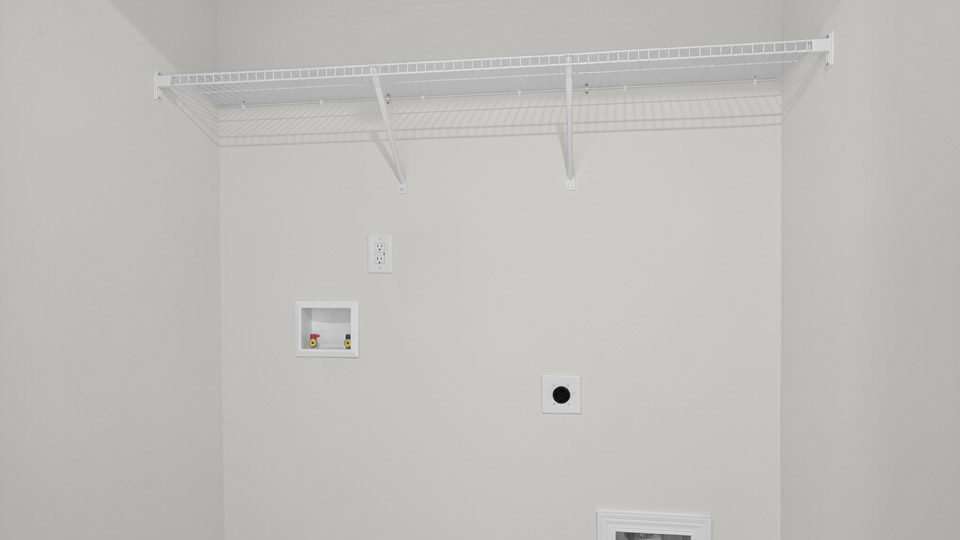 laundry room with wire shelving