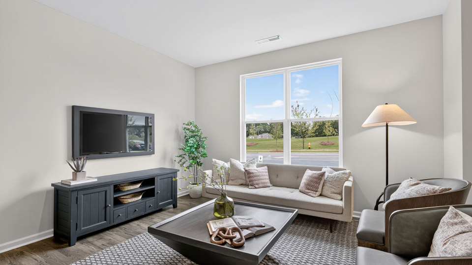 living room with revwood flooring