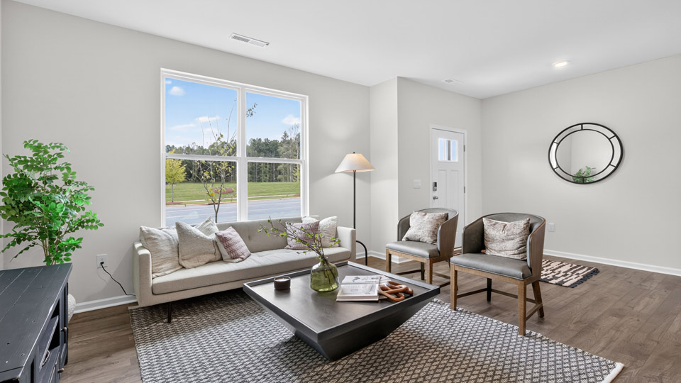 living room with revwood flooring