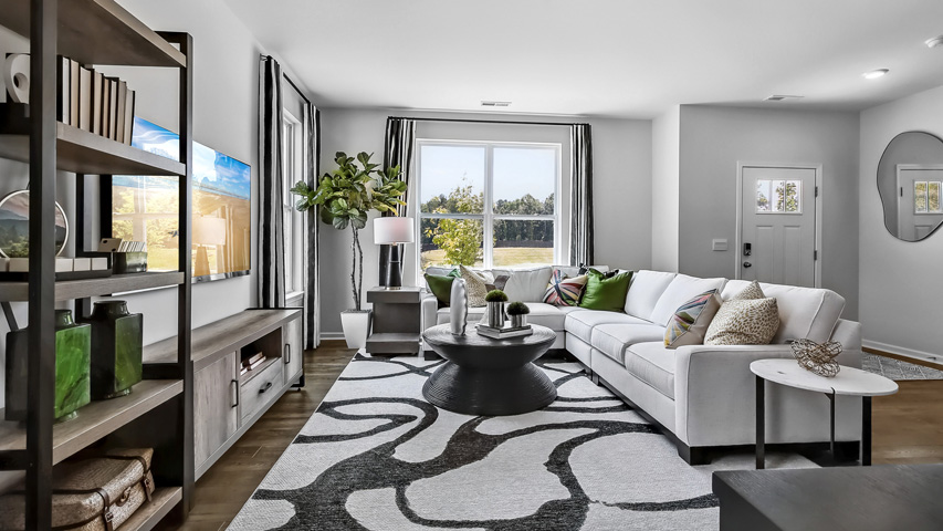 Collin Model living area with revwood flooring