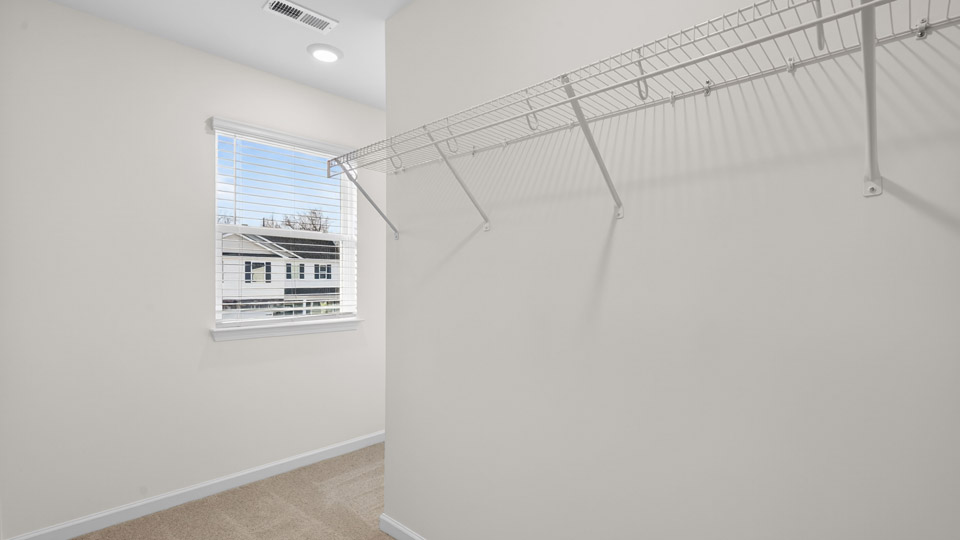 Primary walk-in closet