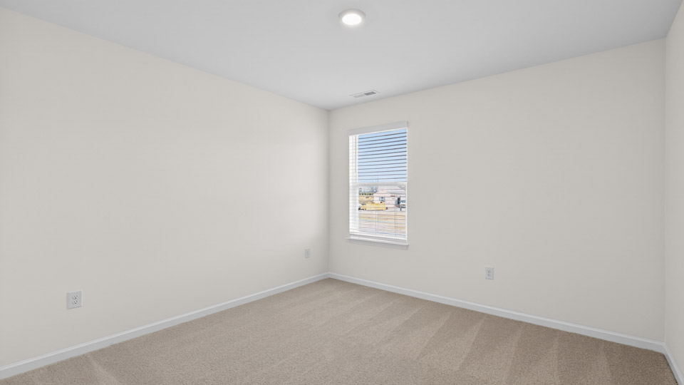 Bedroom with carpet floor and closet
