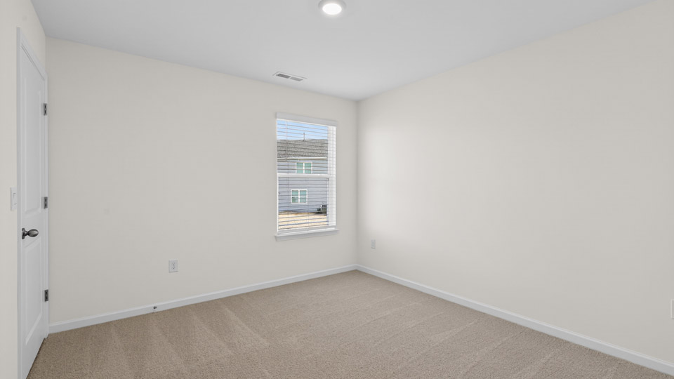 Bedroom with carpet floor and closet
