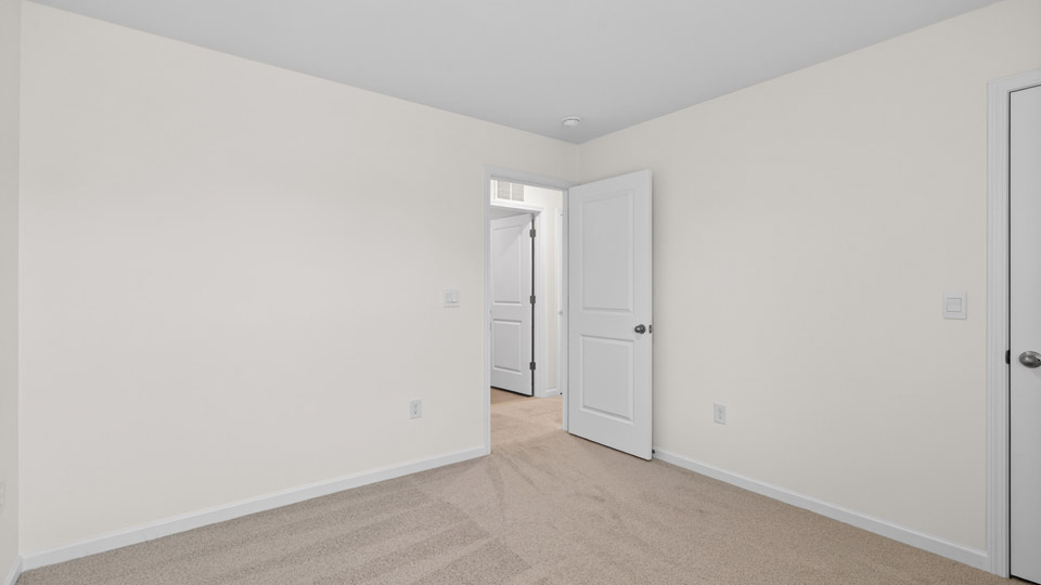 Bedroom with carpet floor and closet