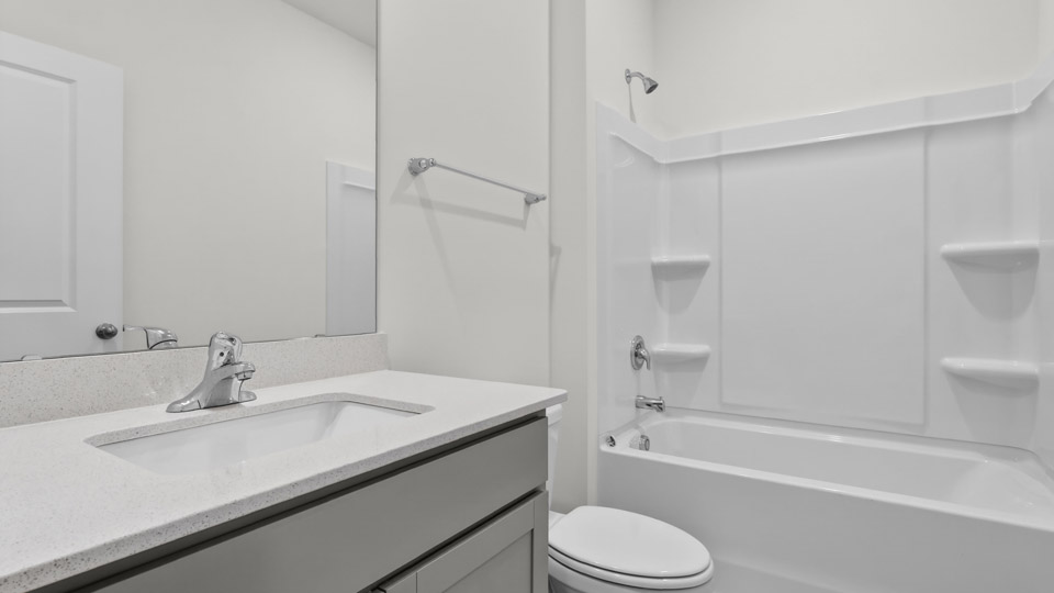 Bathroom with sink and tub