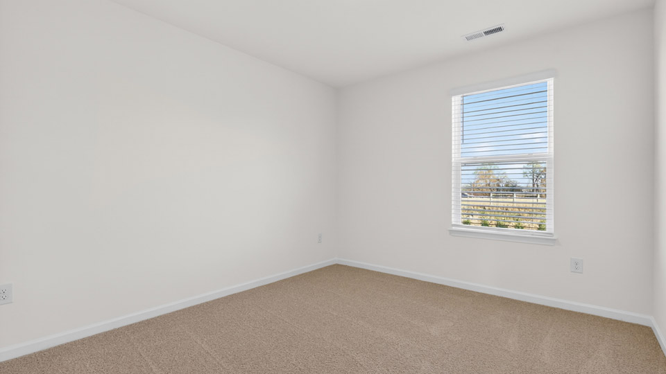 Bedroom with carpet floor and closet