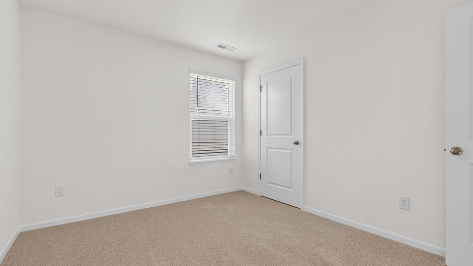 Bedroom with carpet floor and closet
