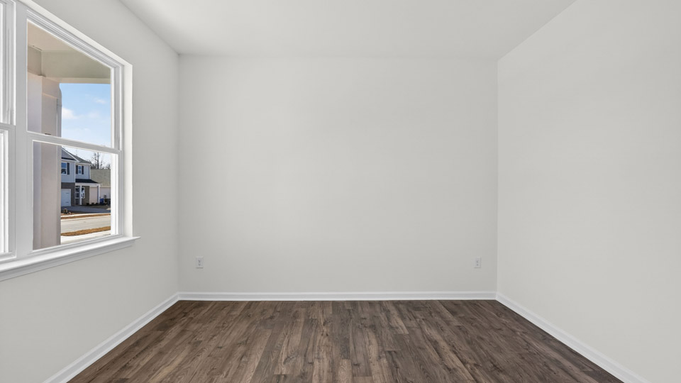 Study room with hardwood floors and big windows