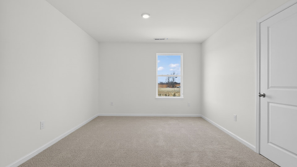 Bedroom with carpet floor and closet