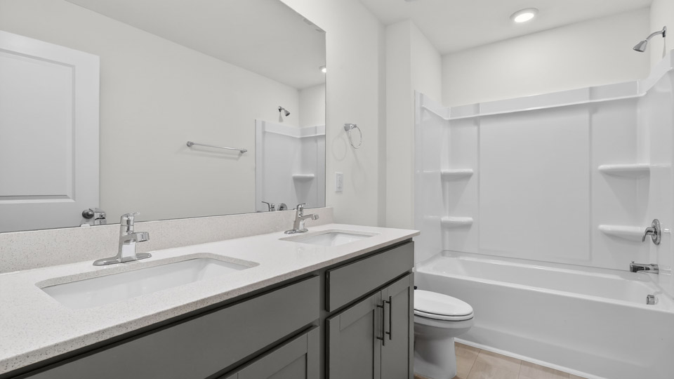 Bathroom with sink and tub