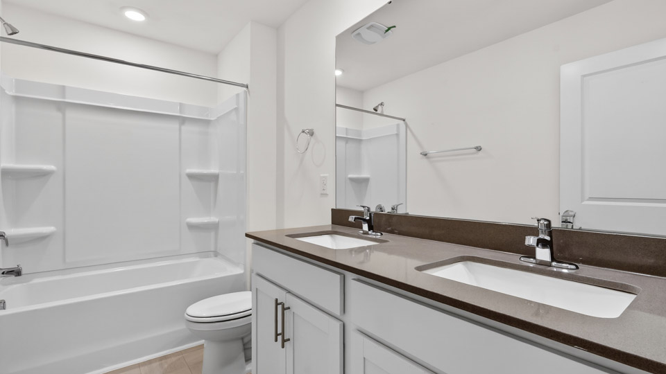 Bathroom with sink and tub