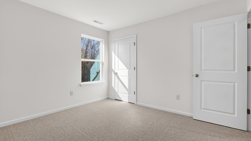 Bedroom with carpet floor and closet