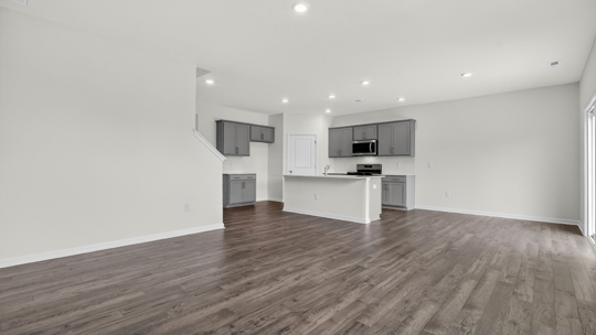 open concept living space with large windows