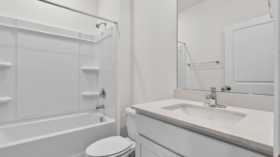 Bathroom with sink and tub