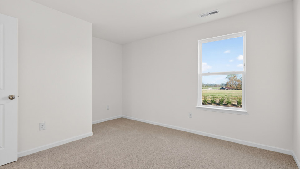 Bedroom with carpet floor and closet