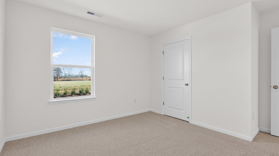 Bedroom with carpet floor and closet