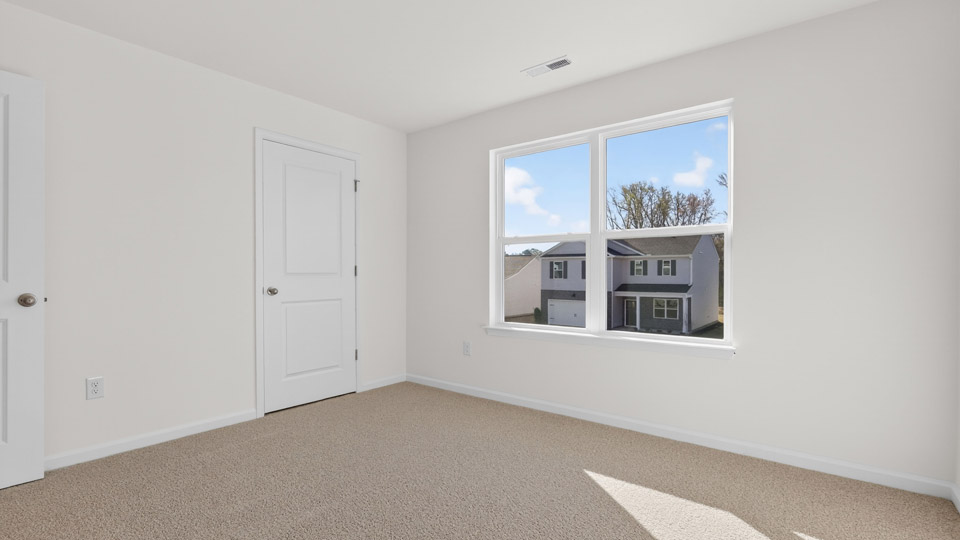 Bedroom with carpet floor and closet