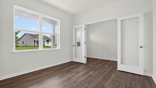 study with french doors and revwood flooring