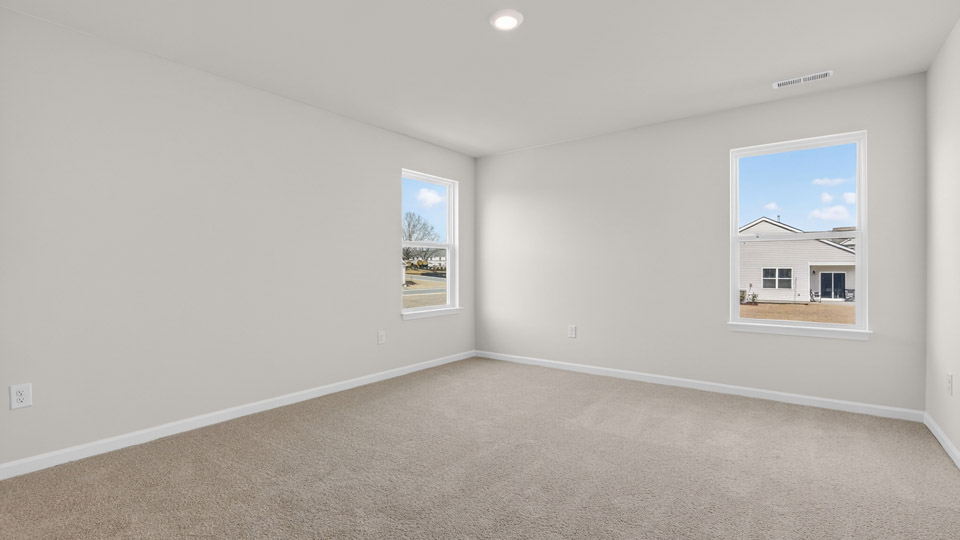 Bedroom with carpet floor and closet