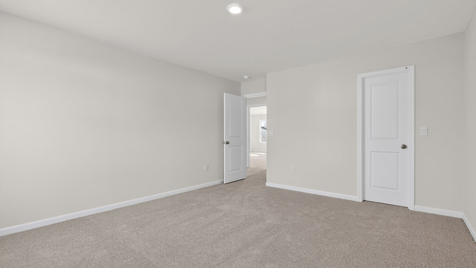 Bedroom with carpet floor and closet