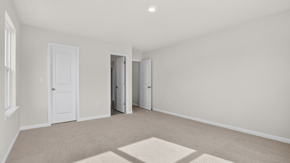 Bedroom with carpet floor and closet