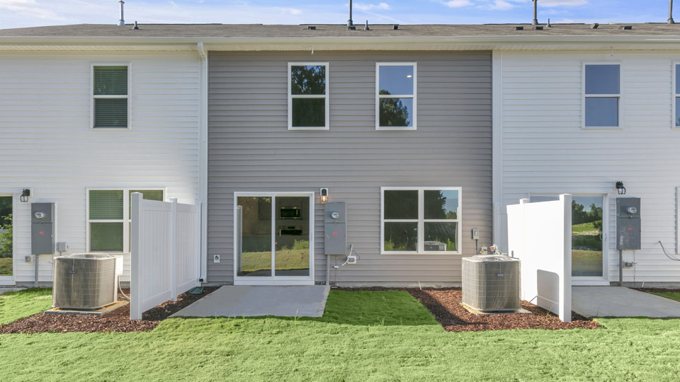 back exterior of altamont b with concrete patio