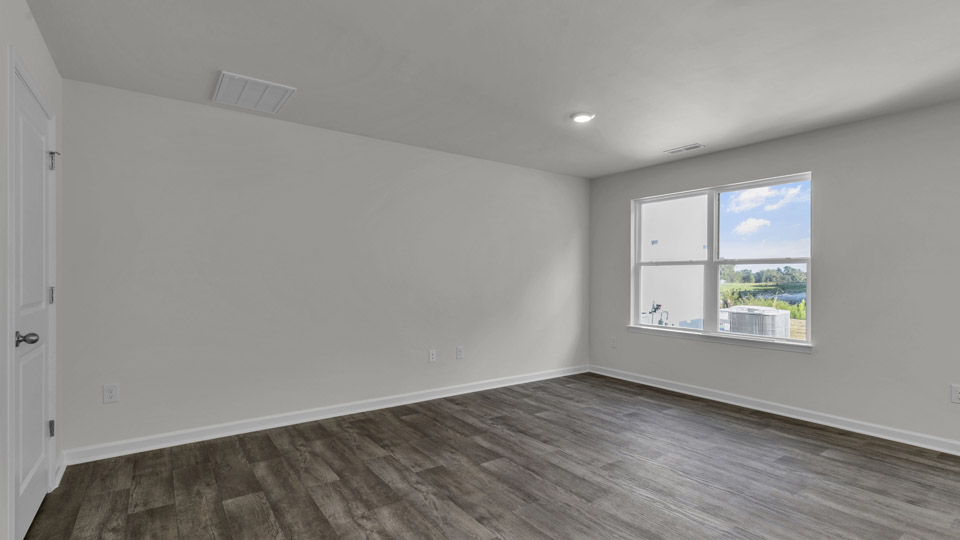 open concept living space with large windows
