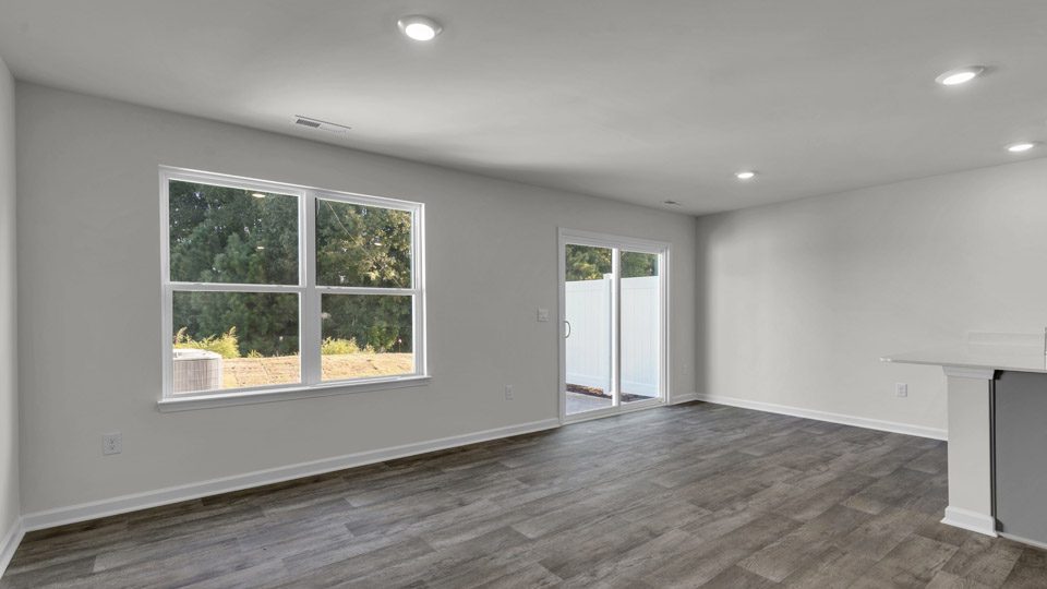open concept living space with large windows