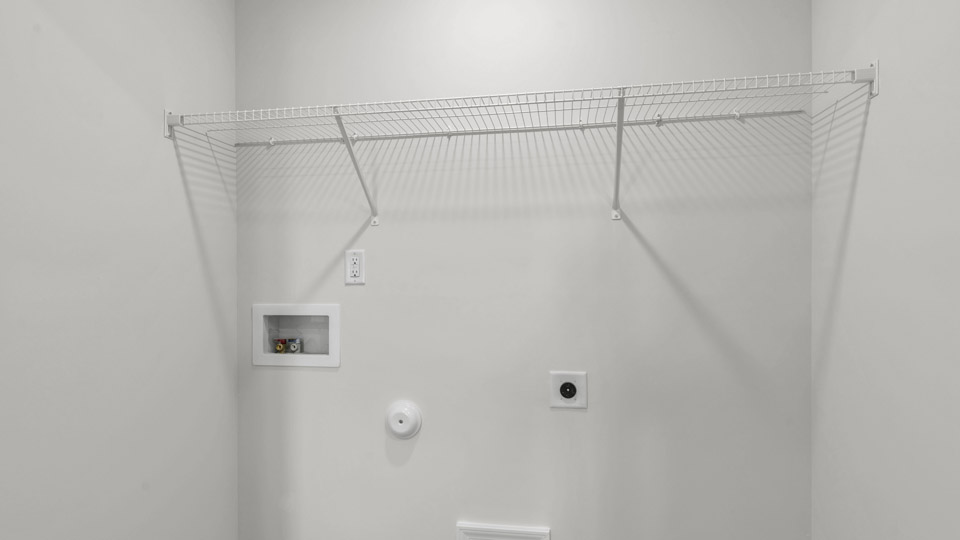 laundry room with wire shelving