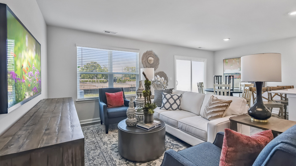 open concept living space with large windows