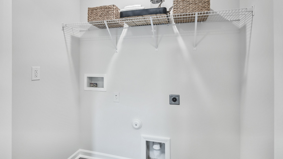 laundry room with wire shelving