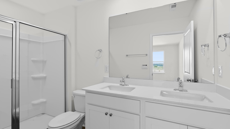 bathroom with walkin shower and quartz countertops