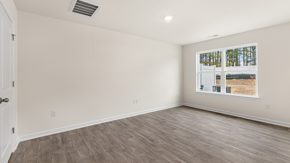 open concept living space with large windows
