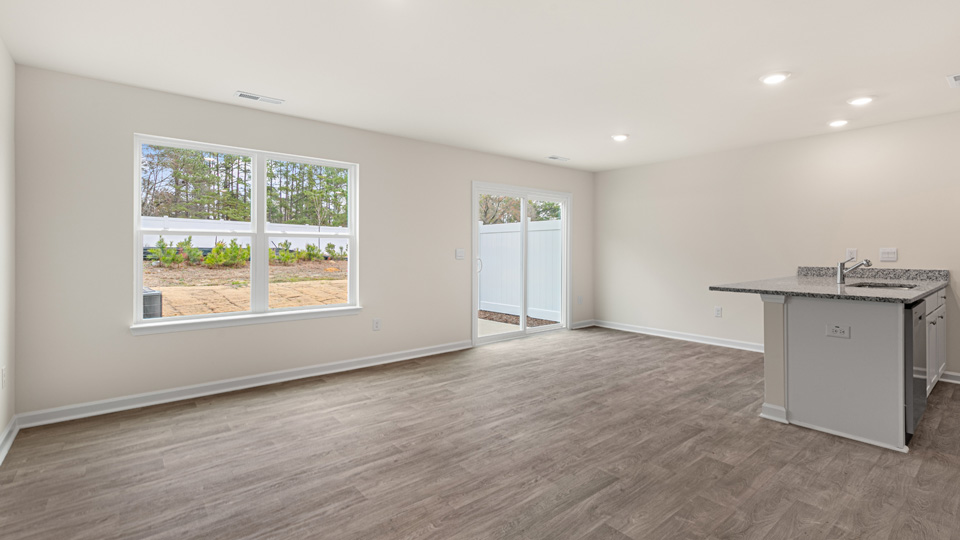 open concept living space with large windows