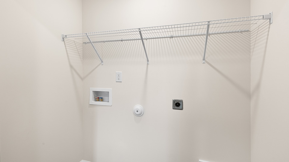 laundry room with wire shelving