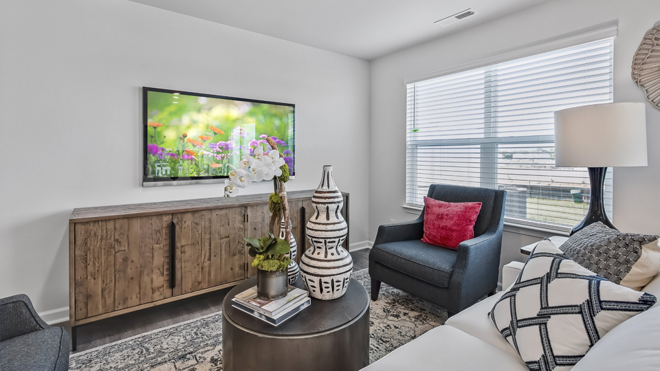 open concept living space with large windows