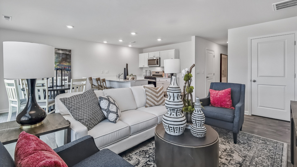 open concept living space with large windows