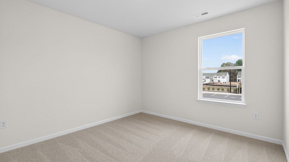 Bedroom with carpet floor and closet