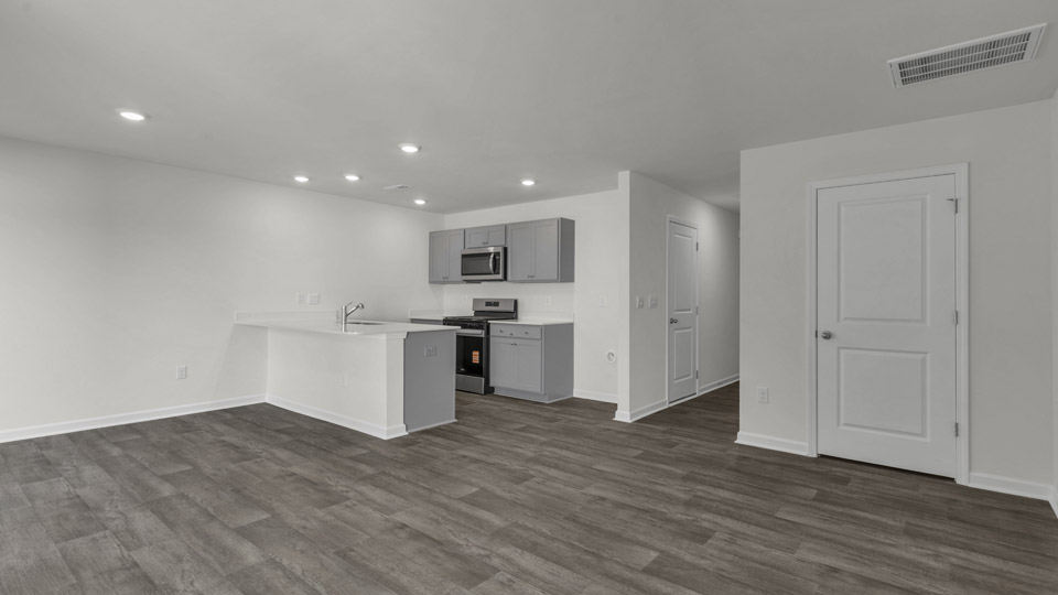 LIVING ROOM, DINING ROOM, AND KITCHEN
