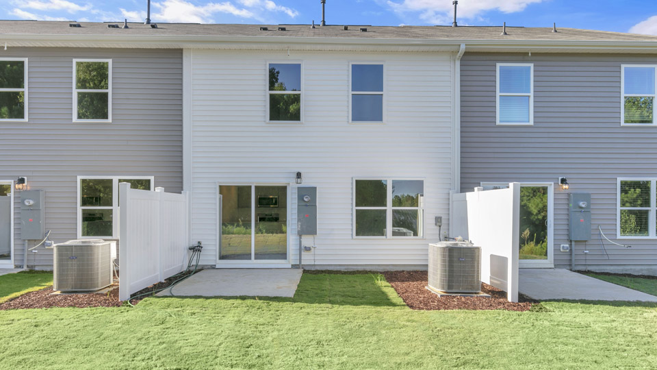 back exterior of mitchell b2 with patio