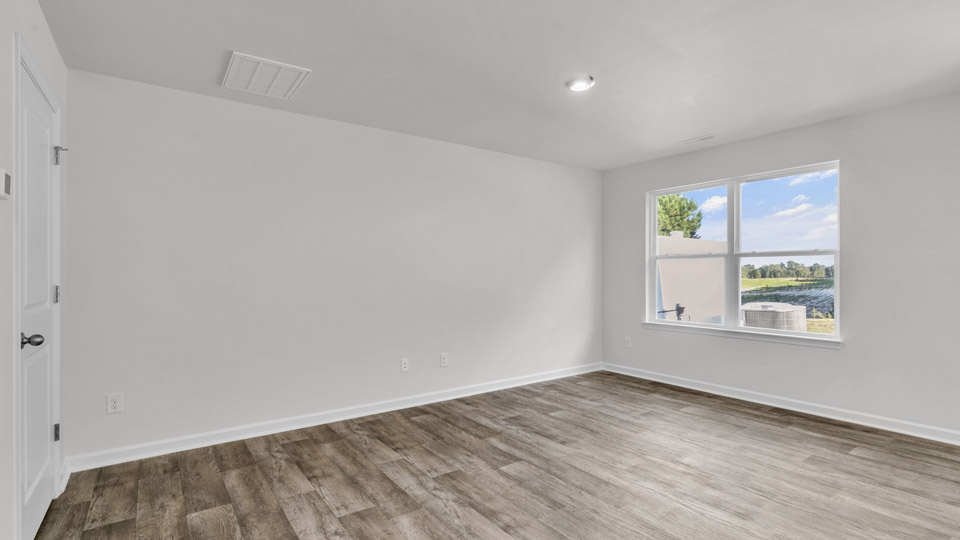 open concept living space with large windows