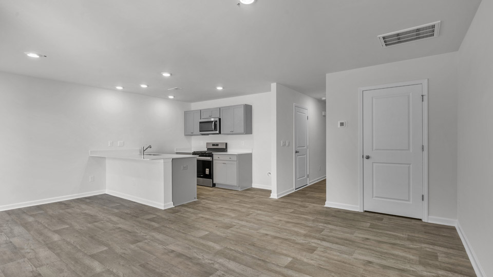 open concept living space with large windows