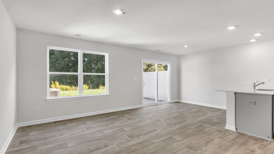 open concept living space with large windows